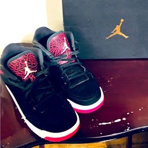 Size 9.5 mens fits size 11 women women JORDANS gently worn black and pink